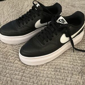 Nike court vision sneakers.